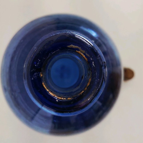 Vintage blue glass bottle used from the 1960s