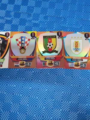 Qatar 2022 cards like new with national team crests and heroes