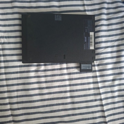 PlayStation 2 Slim console like new with 2 controllers, 2 games, and memory card