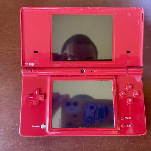 Nintendo DSi console with charger, stylus and memory card