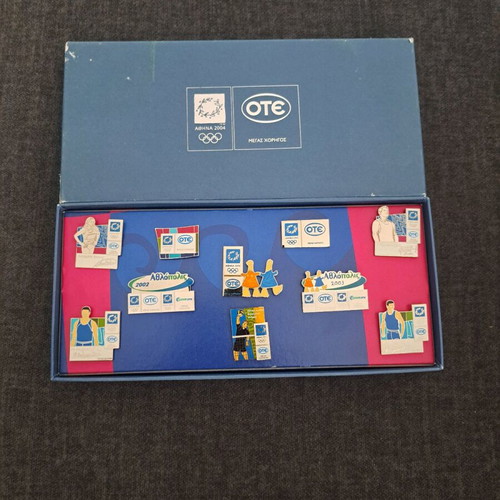 Athens 2004 pins in collectible case like new