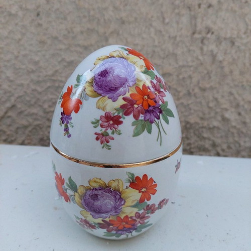 Decorative ceramic Easter egg used with flowers