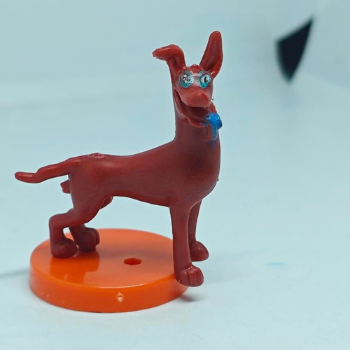 Vintage dog figure like new with orange base