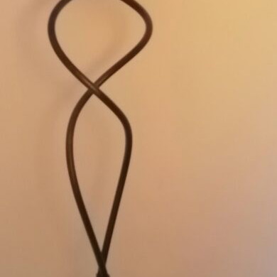 Metal floor stand with twisted design, black iron