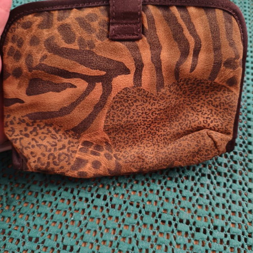 Azzaro Paris travel pouch with animal print design