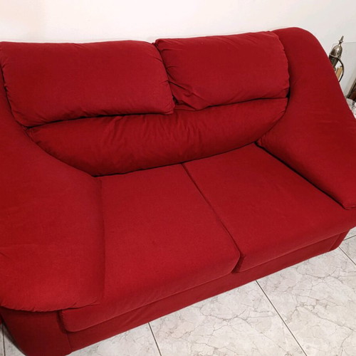 Two-seater waterproof sofa like new with removable cushions