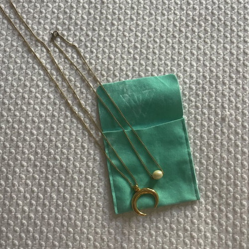 Kymata Jewels gold stainless steel layering necklace set with crescent moon and pearl, used