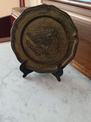 Vintage plate with embossed horse image used