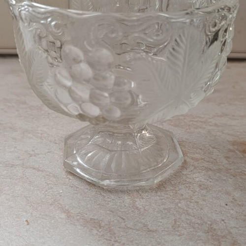 Vintage glass compote with foot and embossed grape design like new