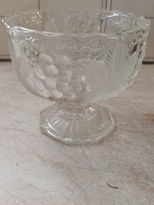 Vintage glass compote with foot and embossed grape design like new