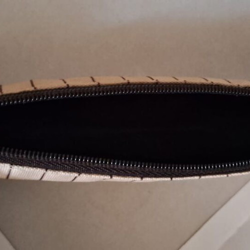 Estee Lauder toiletry bag like new, cream-beige with brown stripes