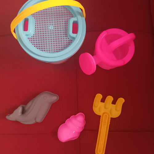 Beach bucket set like new with watering can and sand molds for girls