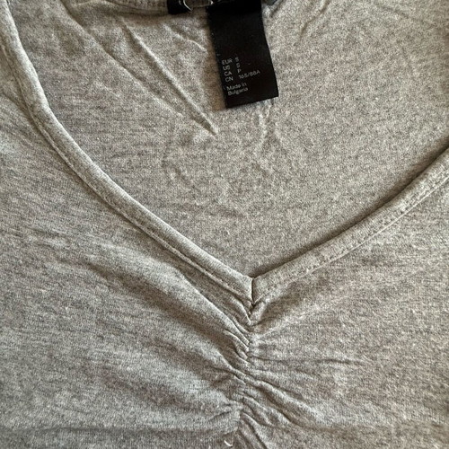 Gray H&M blouse with ruching and V-neck used, size XS