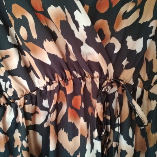 Dress thin in black and brown, like new, one size