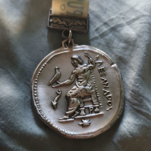 2012 Olympus Marathon finishing medal used