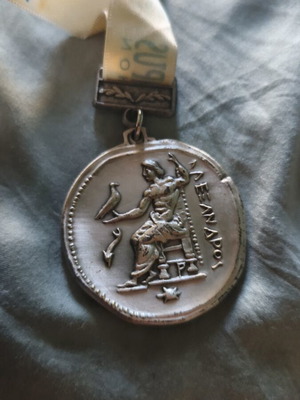 2012 Olympus Marathon finishing medal used