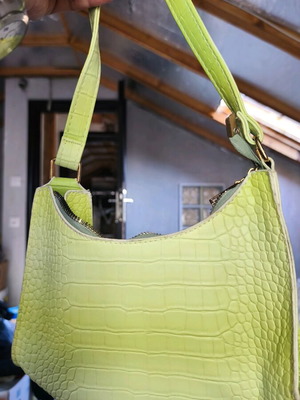 Green used handbag