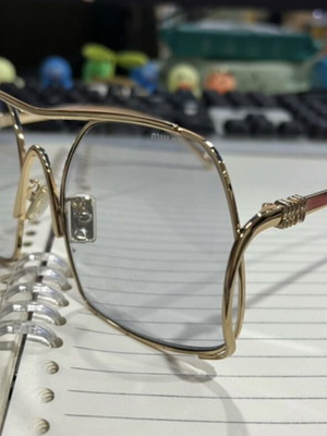 Miu Miu sunglasses like new, gray and gold