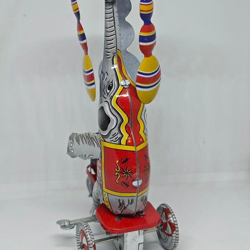 Vintage metal elephant on tricycle like new