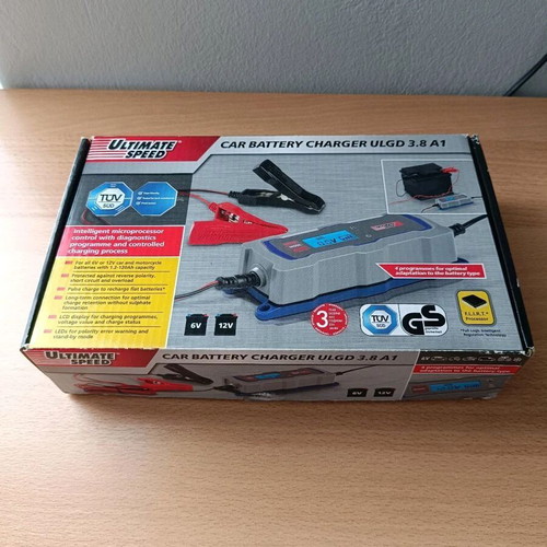 Car and motorcycle battery charger unused