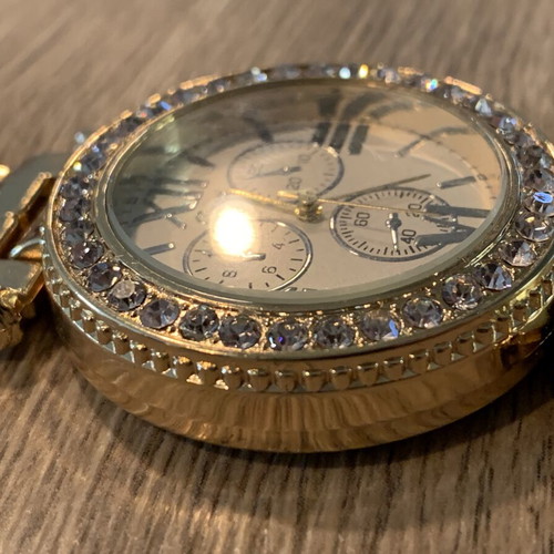 Golden wristwatch, women's