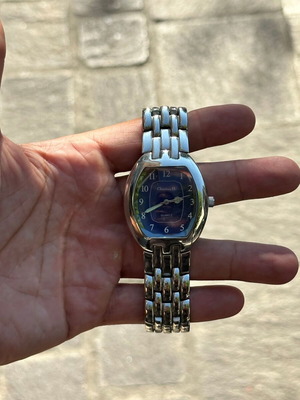Christian D. Quartz watch with blue dial and metal bracelet