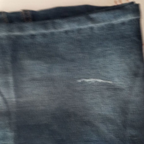 Slim fit blue jeans with leopard detail at hem