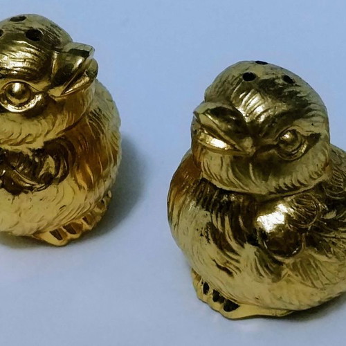 Set of gilded miniature salt and pepper shakers with lead tray
