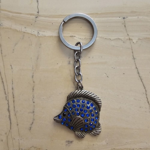 Keychain used, fish design with blue stones