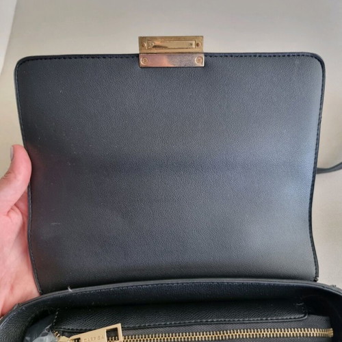 Carpisa black crossbody bag used with magnetic clasp