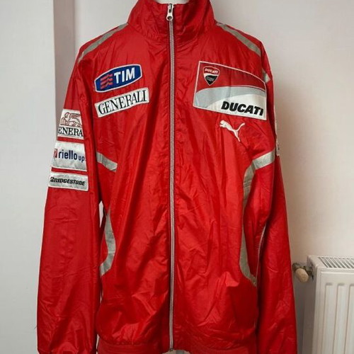 Ducati team jacket used, moderate condition with holes and stains