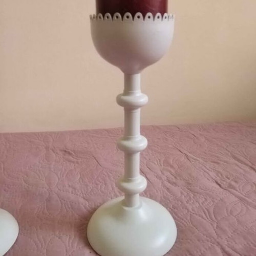Set of two white metal candlesticks with candle like new