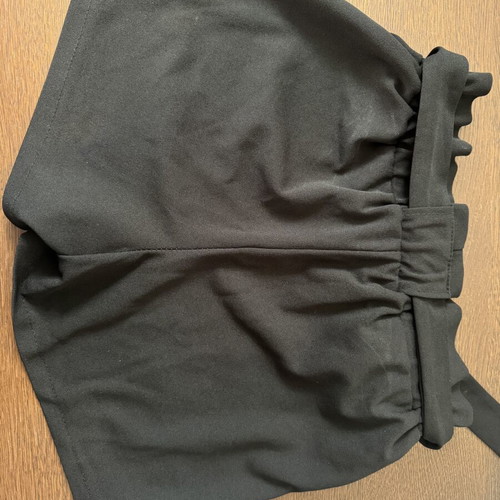 Black shorts with large pockets and belt