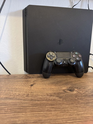 Sony PlayStation 4 console with one controller