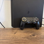 Sony PlayStation 4 console with one controller