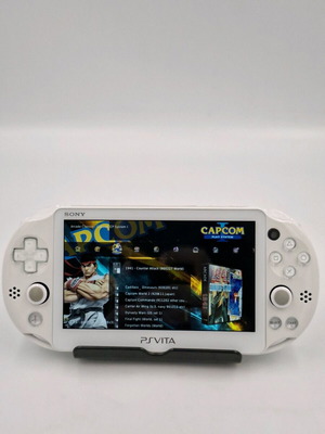 PlayStation Vita Slim White like new, πλήρως modded με 64GB