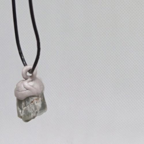 Pendant made of natural stone and polymer clay, tribal style