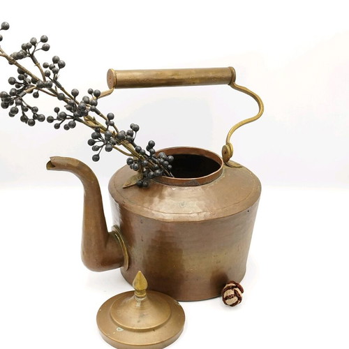 Vintage copper hand-forged teapot used with brass elements