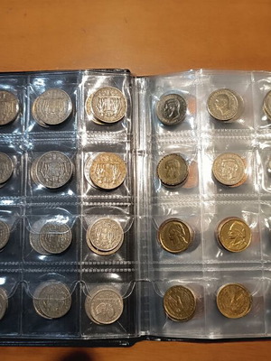 Album of 120 collectible coins from 7 countries