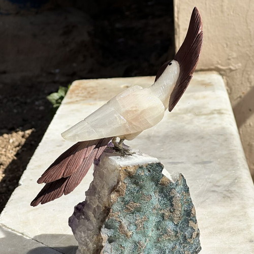 Handmade parrot from quartz on raw amethyst used, 20x15 cm