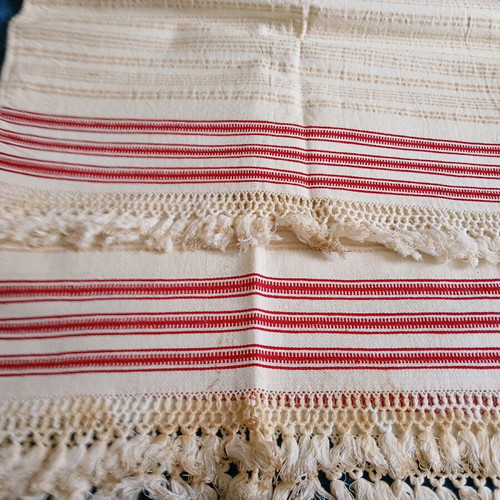 Woven tablecloth like new with hand-tied fringes