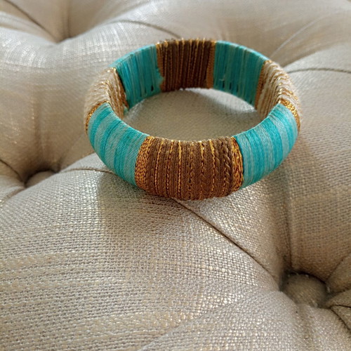 Boho chic thread-wrapped bangle like new, turquoise and gold
