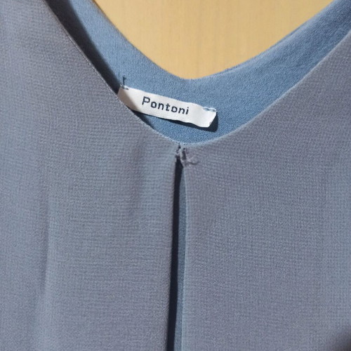Turquoise blouse like new, lightly worn, with transparent sleeves size M