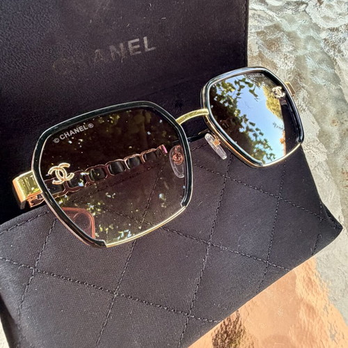 Chanel women's sunglasses black and gold, new model