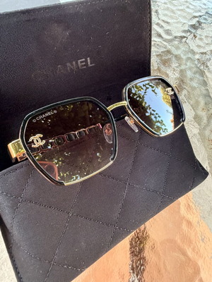 Chanel women's sunglasses black and gold, new model