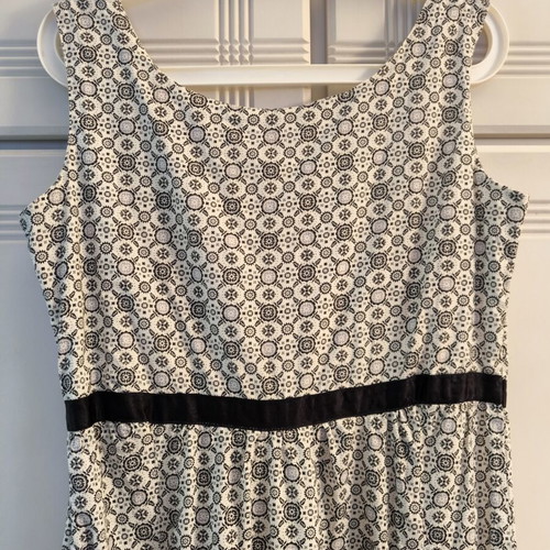 Cotton dress with ruffles, black trims, zipper waist