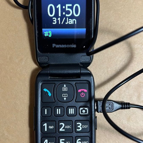 Panasonic KX-TU466 EXBE Black used clamshell phone with SOS button