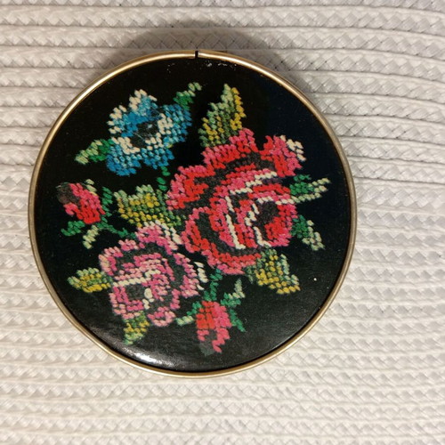 Vintage folding travel mirror with floral design