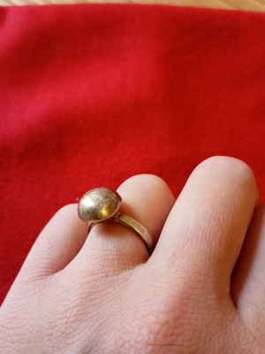 Ring new with red detail on the back