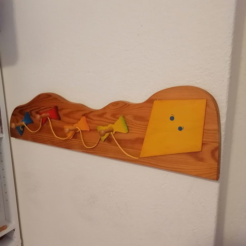 Vintage wooden children's wall hanger with kite design